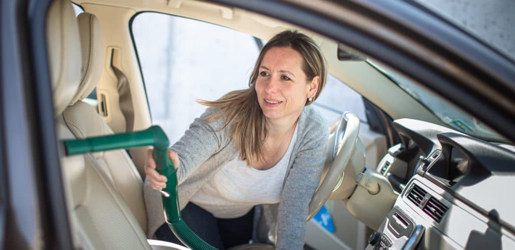 vacuuming car